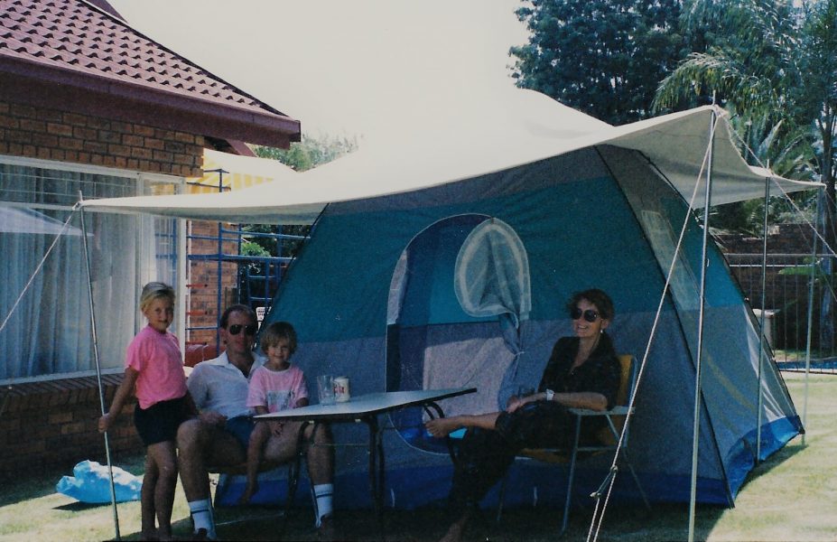 Family camping in yard